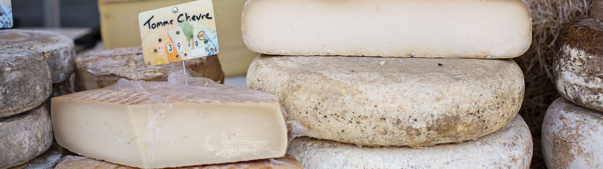 Various cheeses on display. 